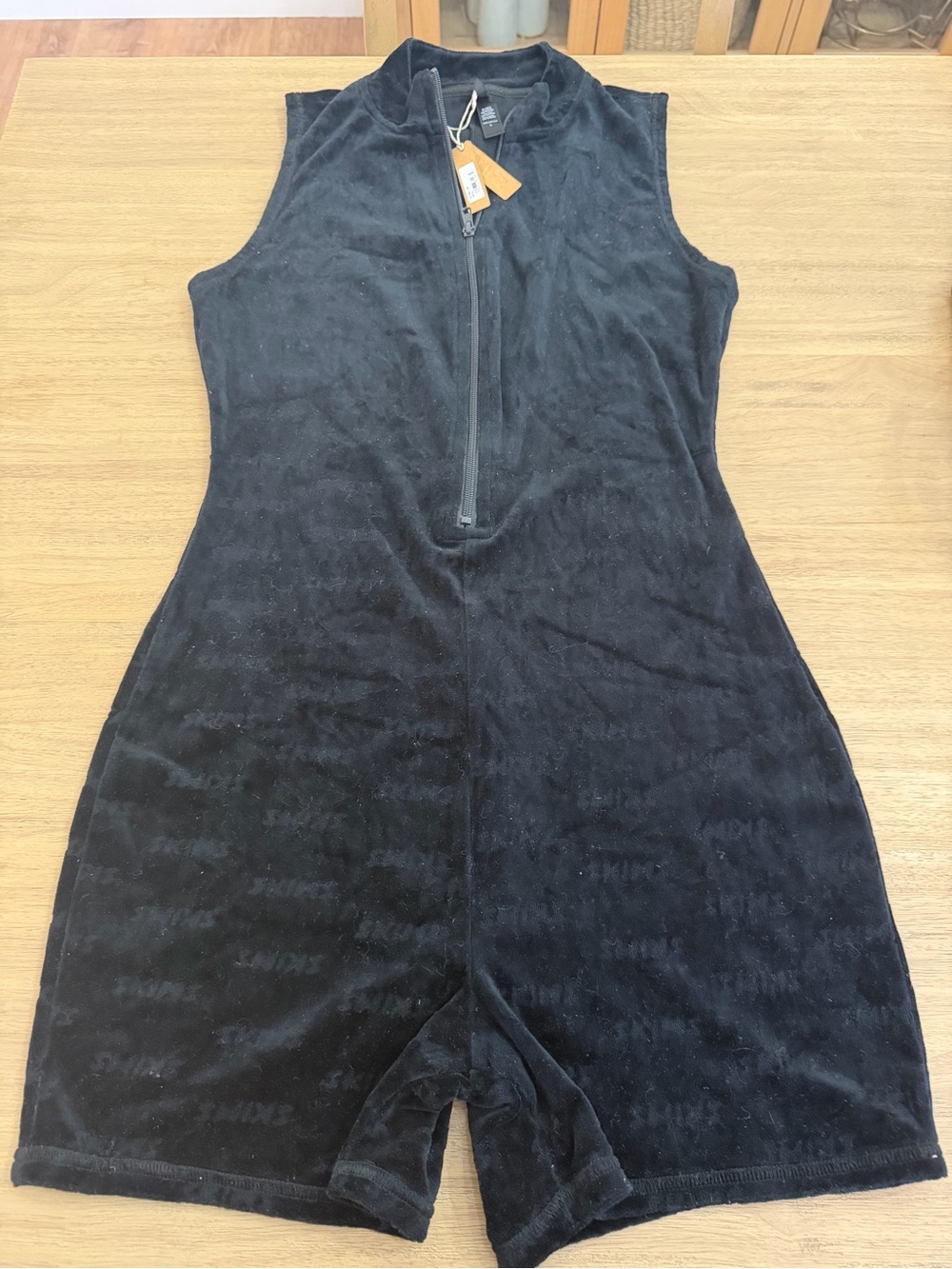 SKIMS Black velour onesie